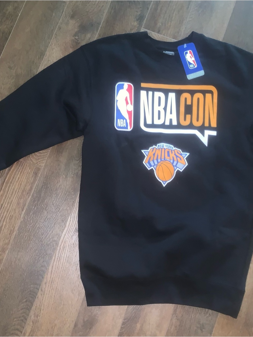 NBA Black Crewneck with Orange New York Knicks Text… Easter League Champs 2026